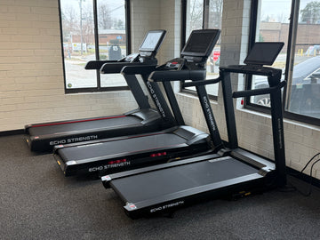 Three Echo Strength treadmill models by windows